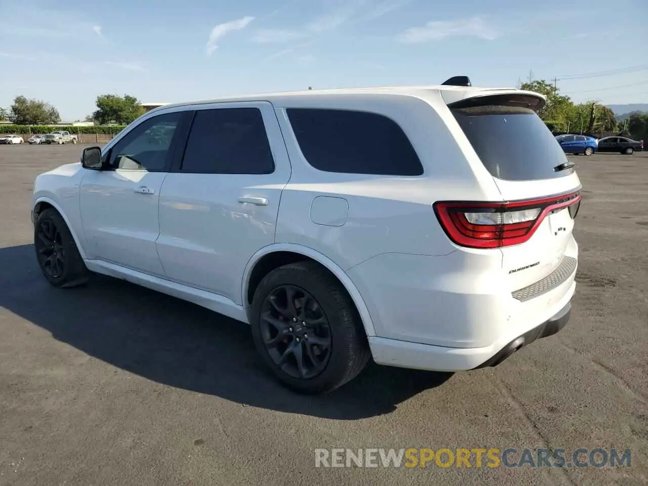 2 fotografías del automóvil dañado 1C4SDJH96PC552973 DODGE DURANGO 2023