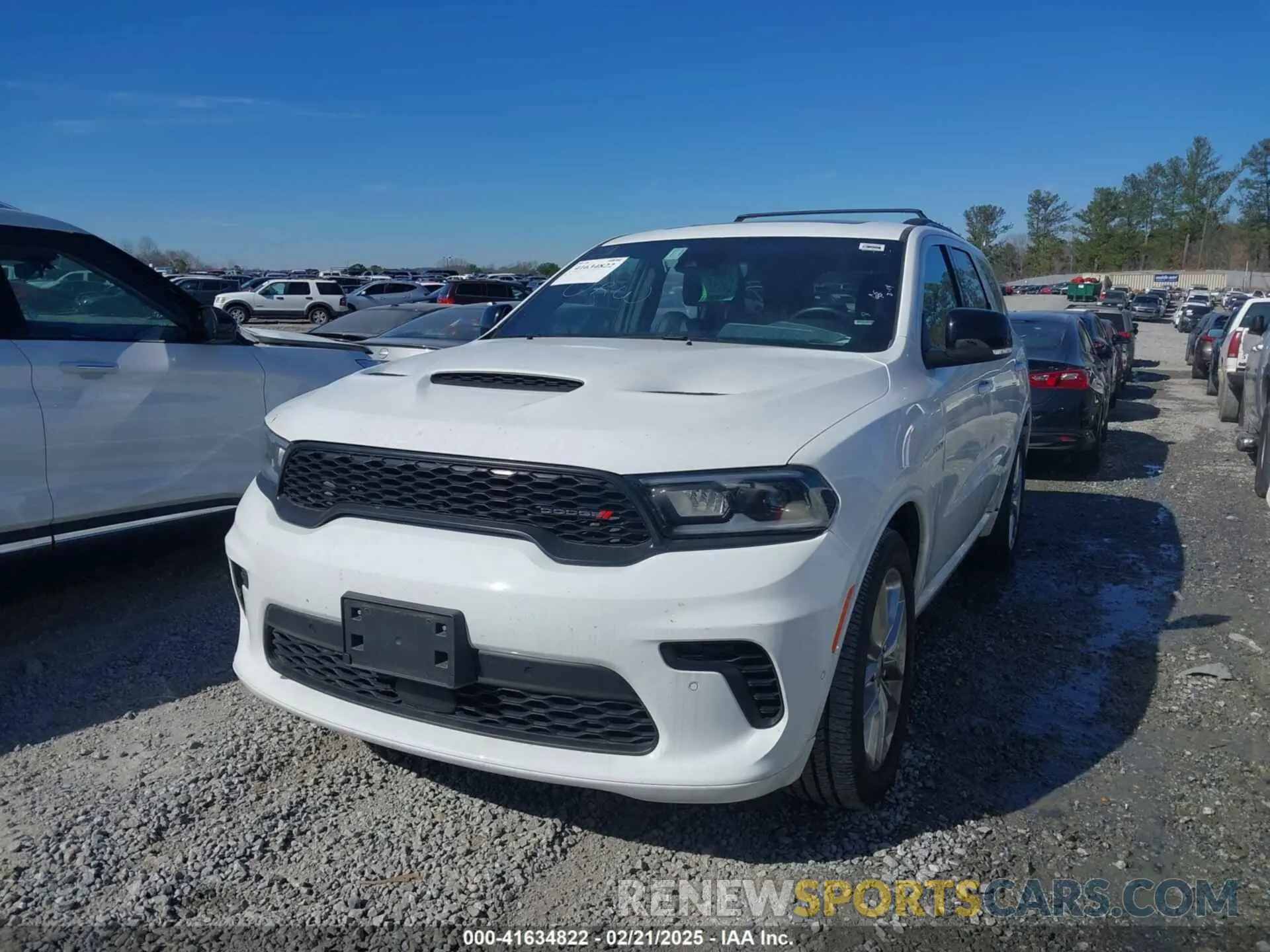 2 fotografías del automóvil dañado 1C4SDJCT3RC143917 DODGE DURANGO 2024
