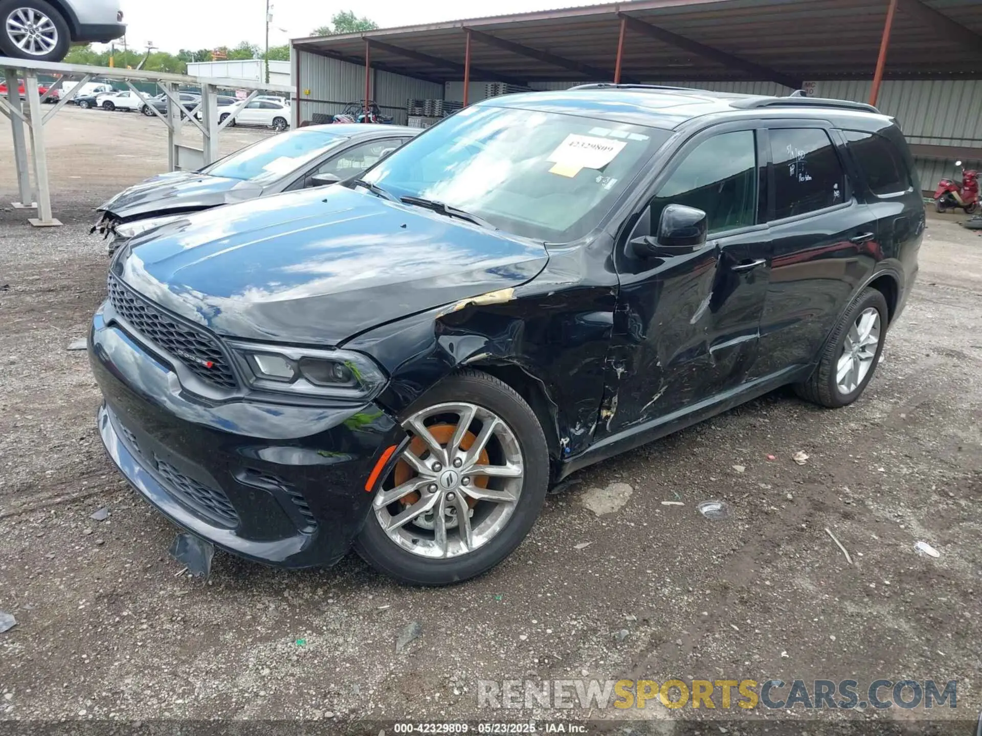 2 fotografías del automóvil dañado 1C4RDJDG1SC517771 DODGE DURANGO 2025