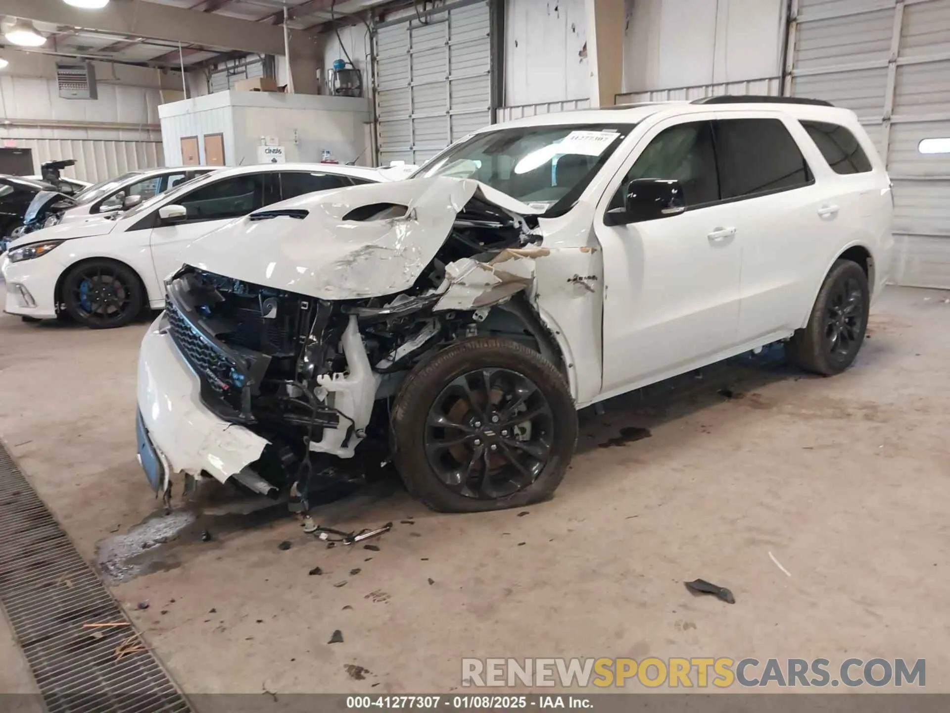 2 fotografías del automóvil dañado 1C4SDJCT1SC503496 DODGE DURANGO 2025