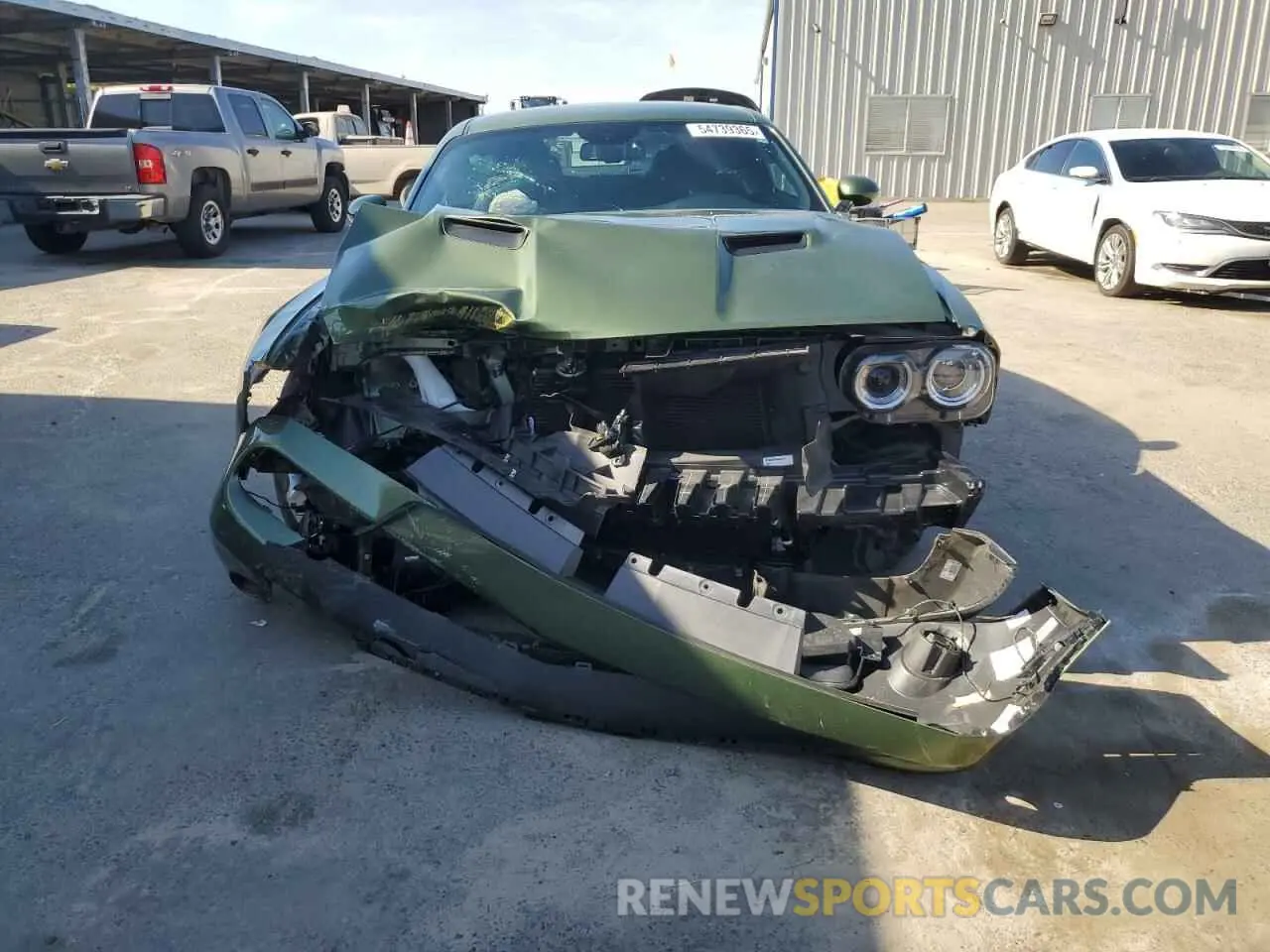 5 fotografías del automóvil dañado 2C3CDZAG4NH155742 DODGE RAM 1500 2022