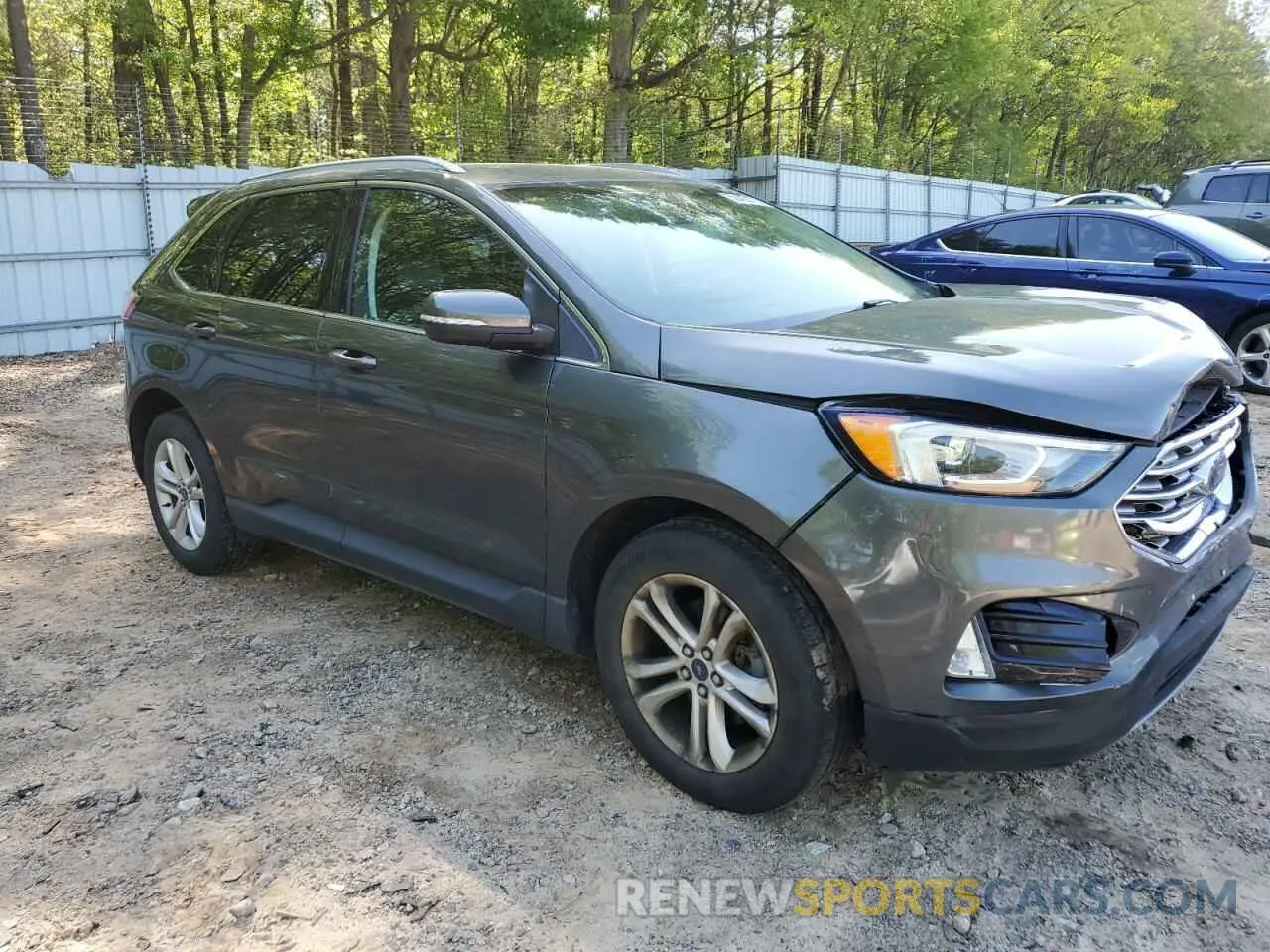 4 fotografías del automóvil dañado 2FMPK3J93KBC24352 FORD EDGE 2019