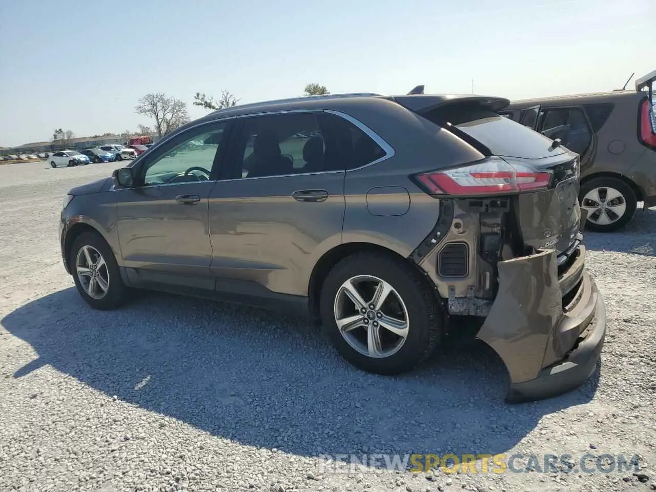 2 fotografías del automóvil dañado 2FMPK3J94KBB34594 FORD EDGE 2019