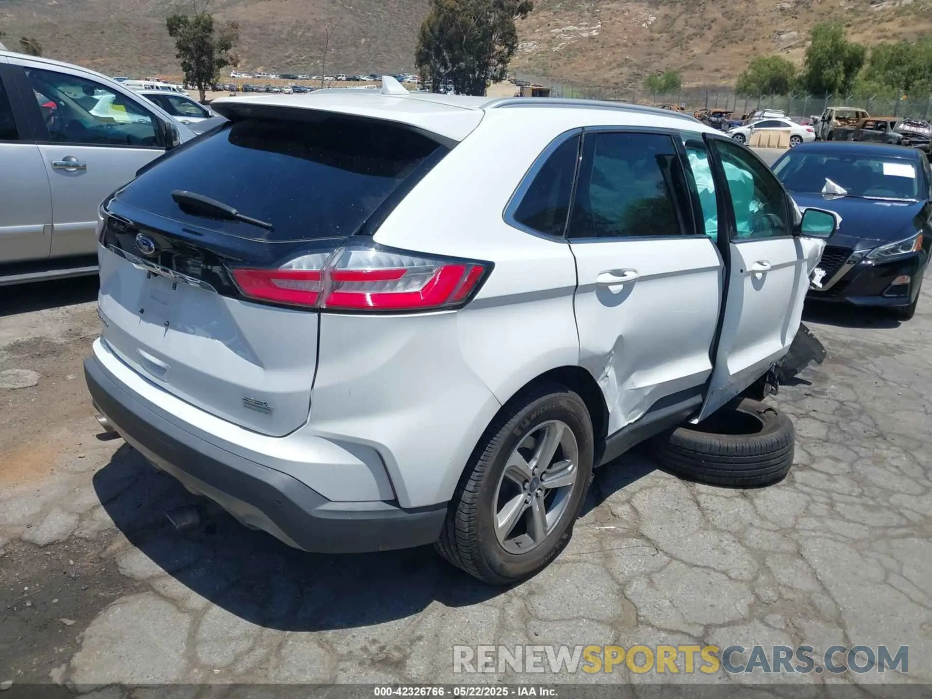 4 fotografías del automóvil dañado 2FMPK3J97KBB49378 FORD EDGE 2019