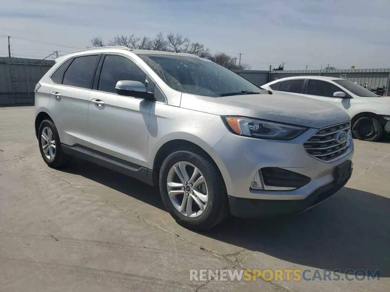 4 fotografías del automóvil dañado 2FMPK3J9XKBC26681 FORD EDGE 2019