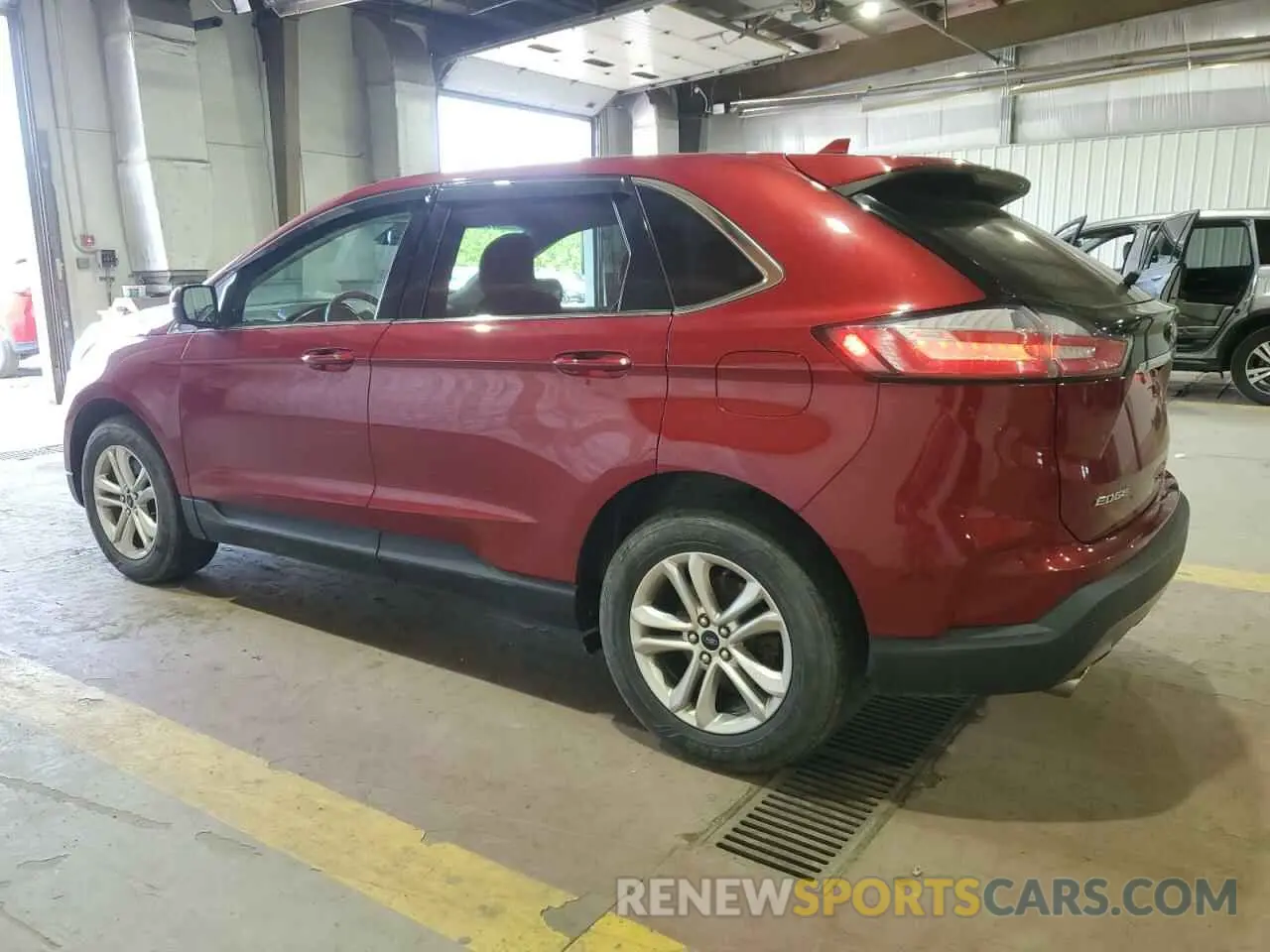 2 fotografías del automóvil dañado 2FMPK4J90KBB44576 FORD EDGE 2019
