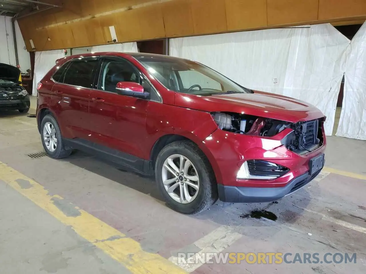 4 fotografías del automóvil dañado 2FMPK4J90KBB44576 FORD EDGE 2019