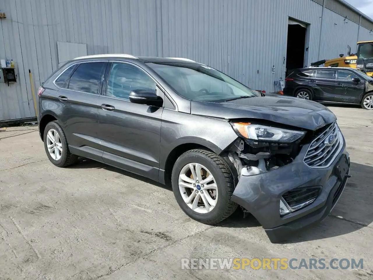 4 fotografías del automóvil dañado 2FMPK4J94KBC40808 FORD EDGE 2019