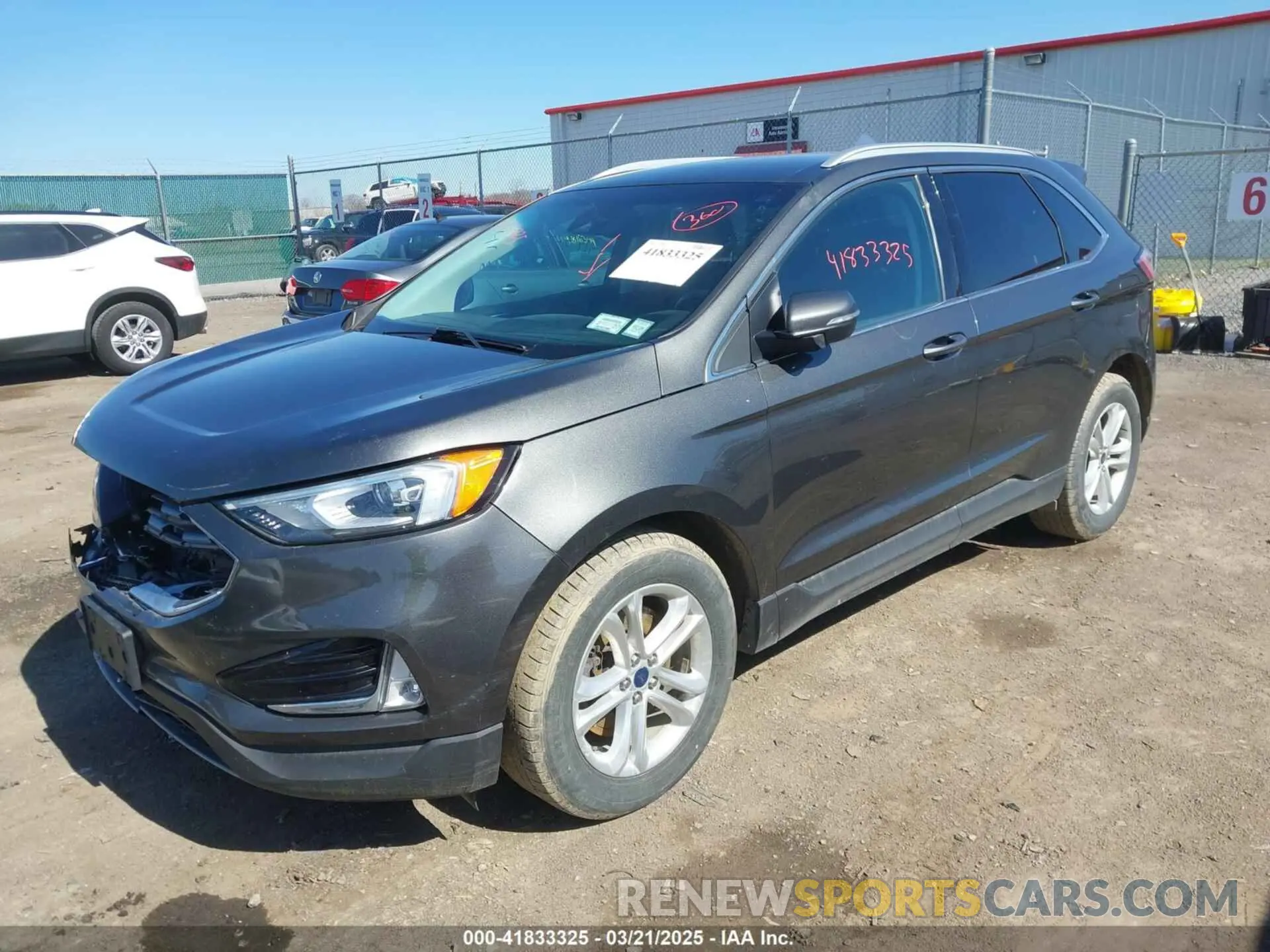 2 fotografías del automóvil dañado 2FMPK4J95KBB73037 FORD EDGE 2019