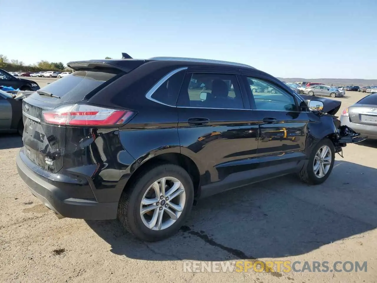 3 fotografías del automóvil dañado 2FMPK4J99KBB47590 FORD EDGE 2019