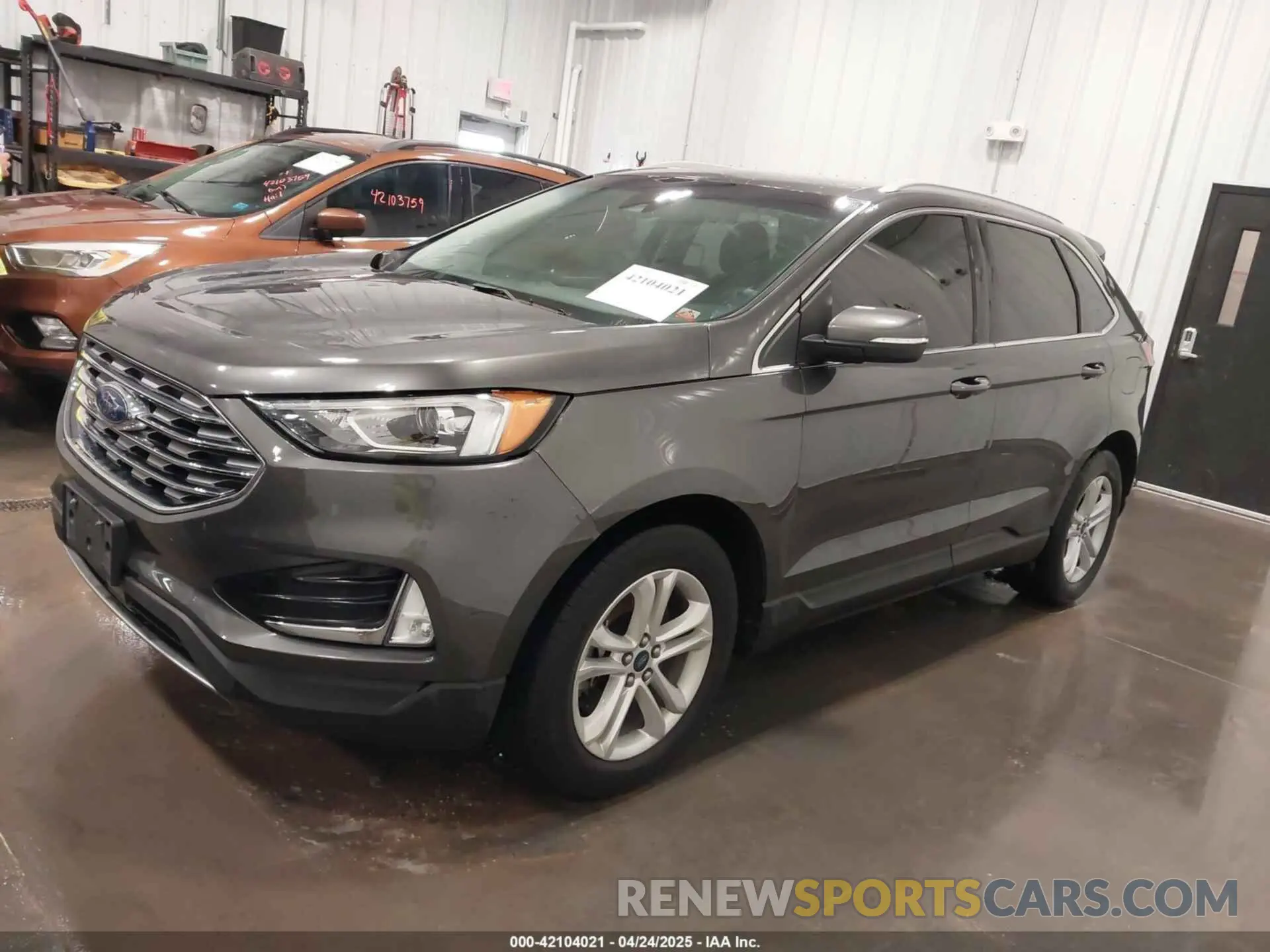 2 fotografías del automóvil dañado 2FMPK4J99KBB69279 FORD EDGE 2019