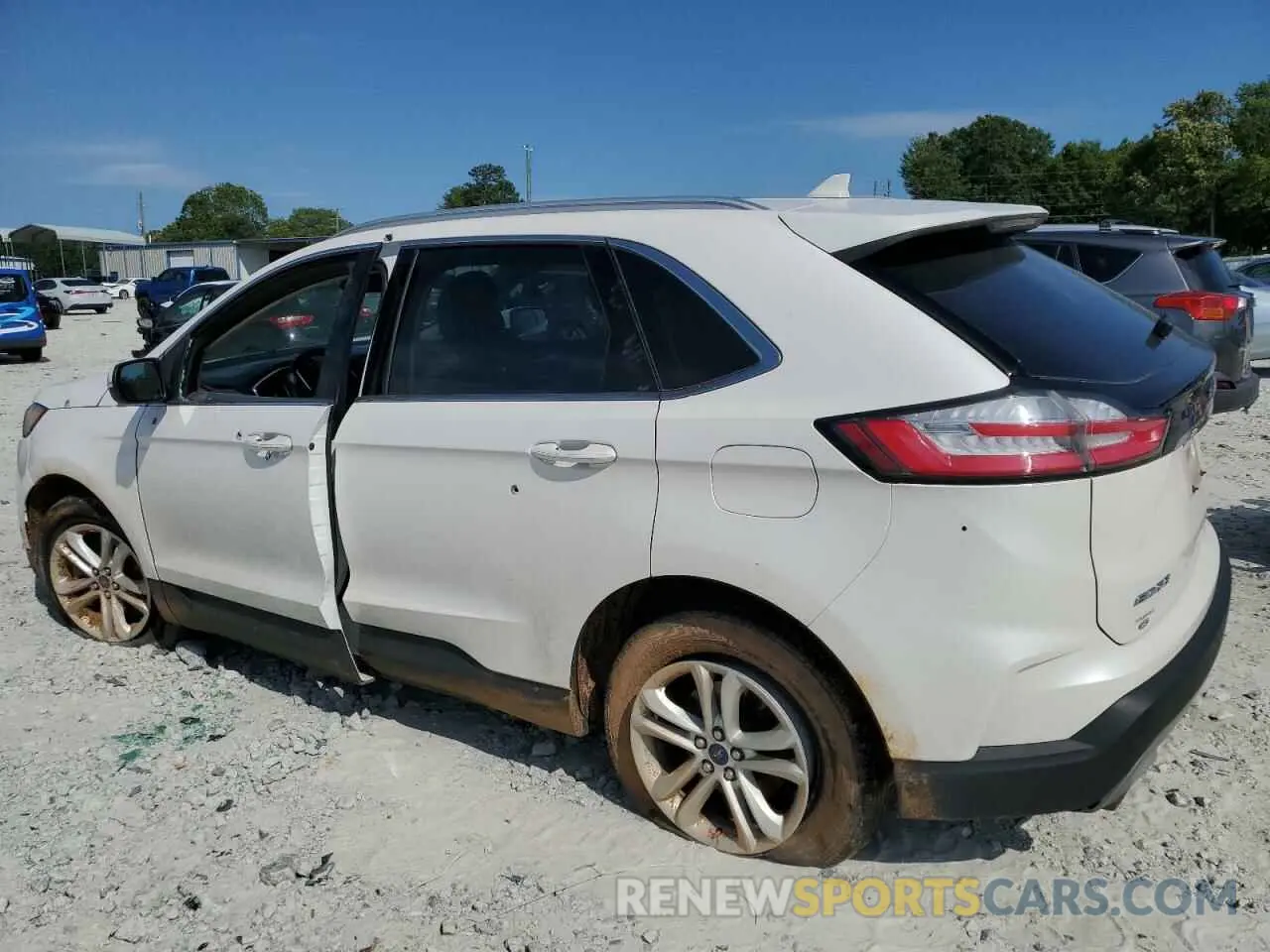2 fotografías del automóvil dañado 2FMPK4J99KBC60200 FORD EDGE 2019