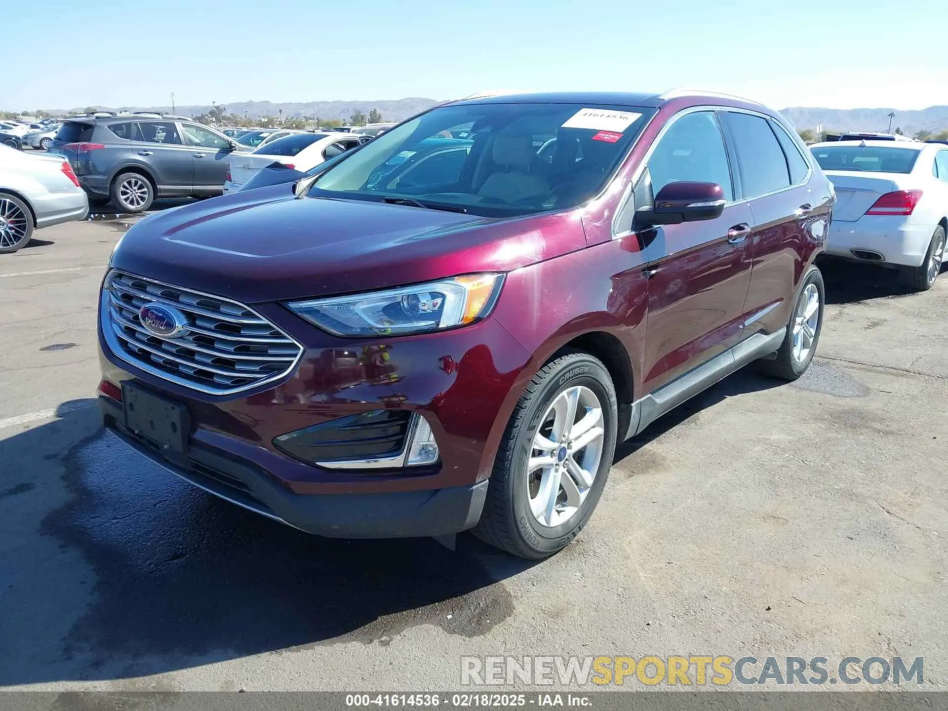 2 fotografías del automóvil dañado 2FMPK4J9XKBB10449 FORD EDGE 2019