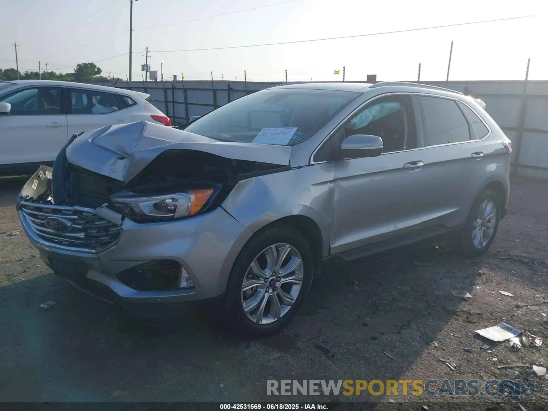 2 fotografías del automóvil dañado 2FMPK3K91LBA69509 FORD EDGE 2020