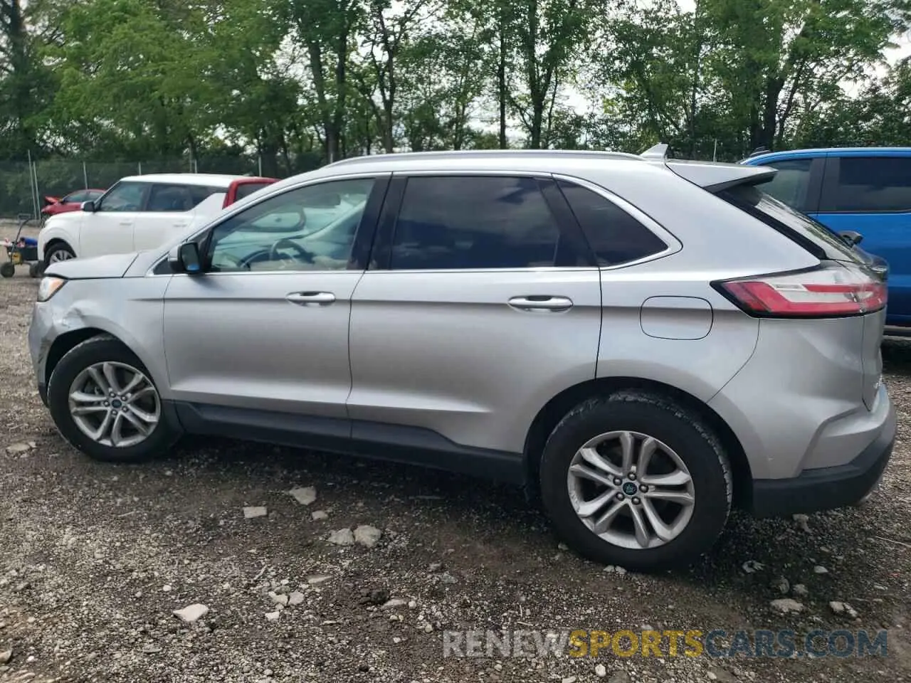 2 fotografías del automóvil dañado 2FMPK4J90LBB01731 FORD EDGE 2020