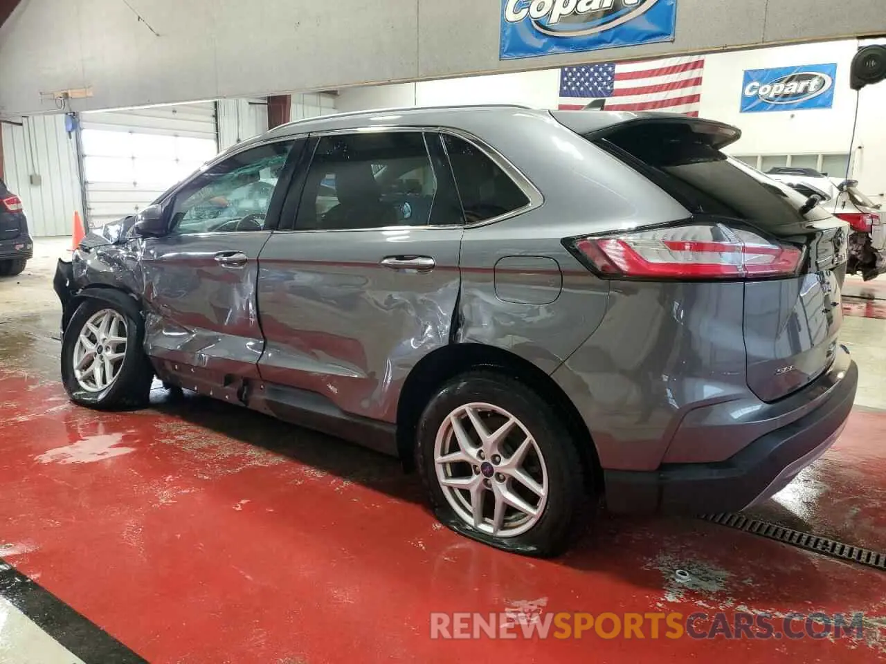 2 fotografías del automóvil dañado 2FMPK4J90MBA02554 FORD EDGE 2021