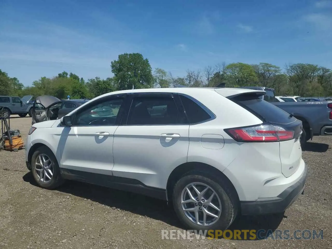 2 fotografías del automóvil dañado 2FMPK4J92MBA47754 FORD EDGE 2021