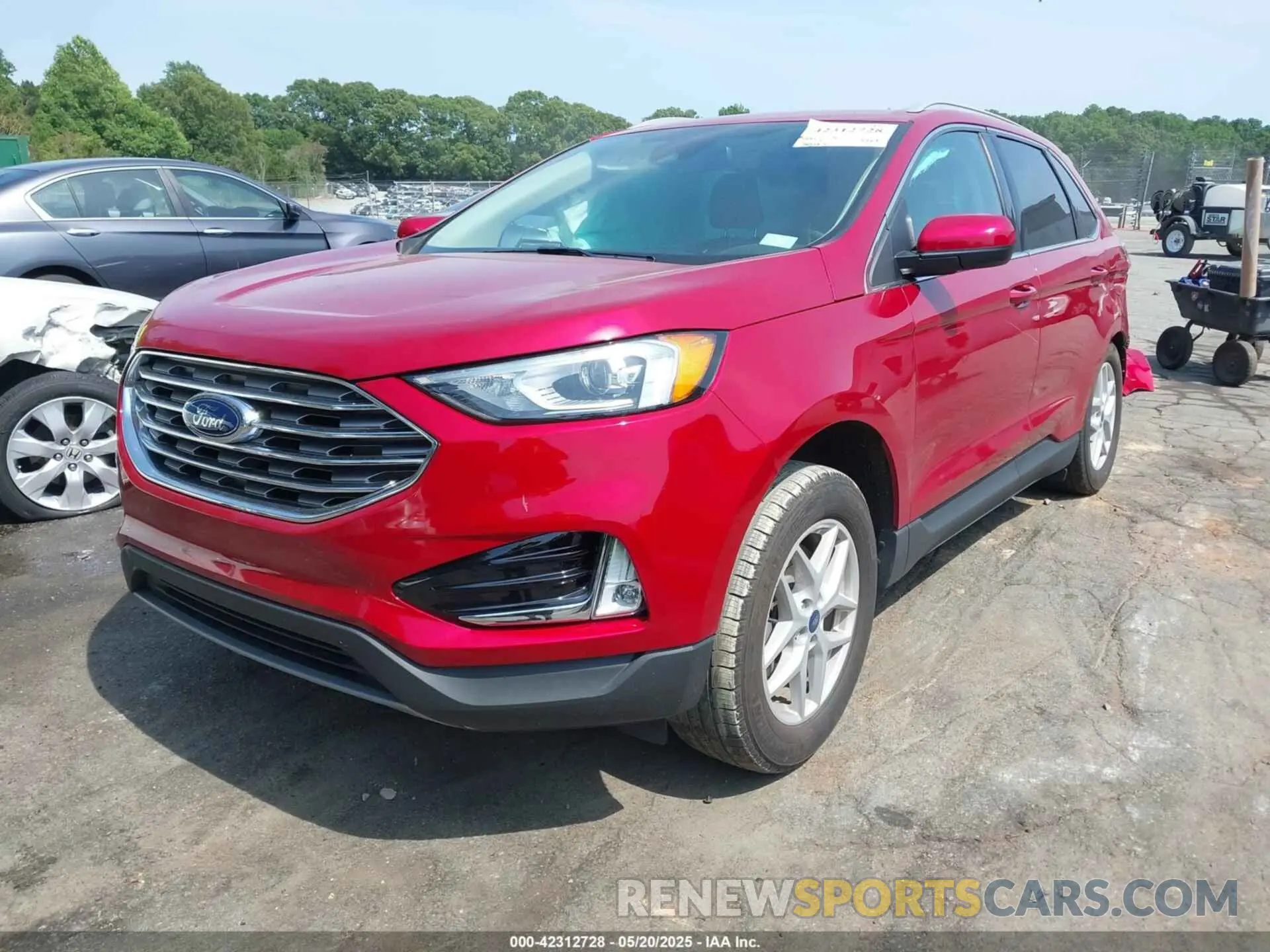 2 fotografías del automóvil dañado 2FMPK4J93MBA36567 FORD EDGE 2021