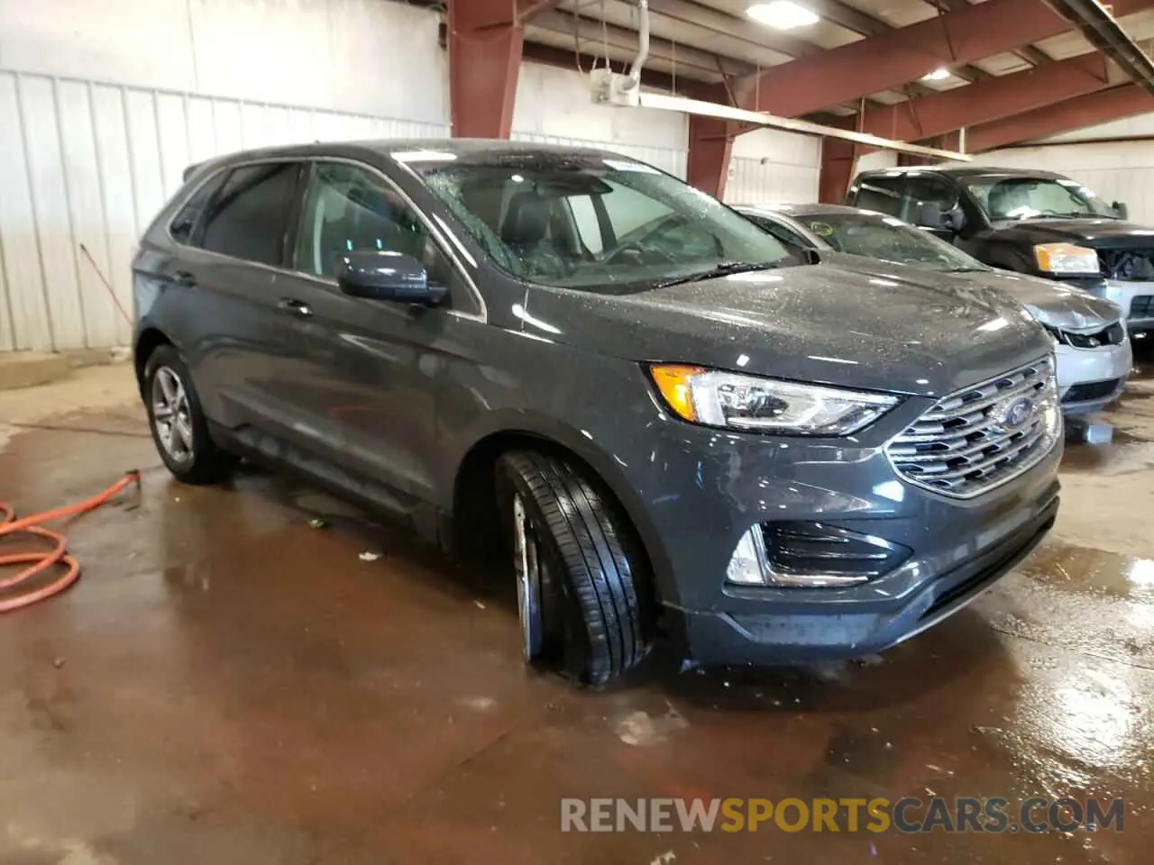 4 fotografías del automóvil dañado 2FMPK4J96MBA35378 FORD EDGE 2021