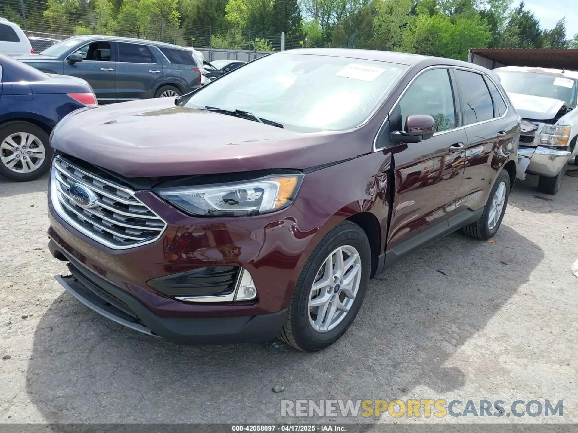 2 fotografías del automóvil dañado 2FMPK4J9XMBA44133 FORD EDGE 2021