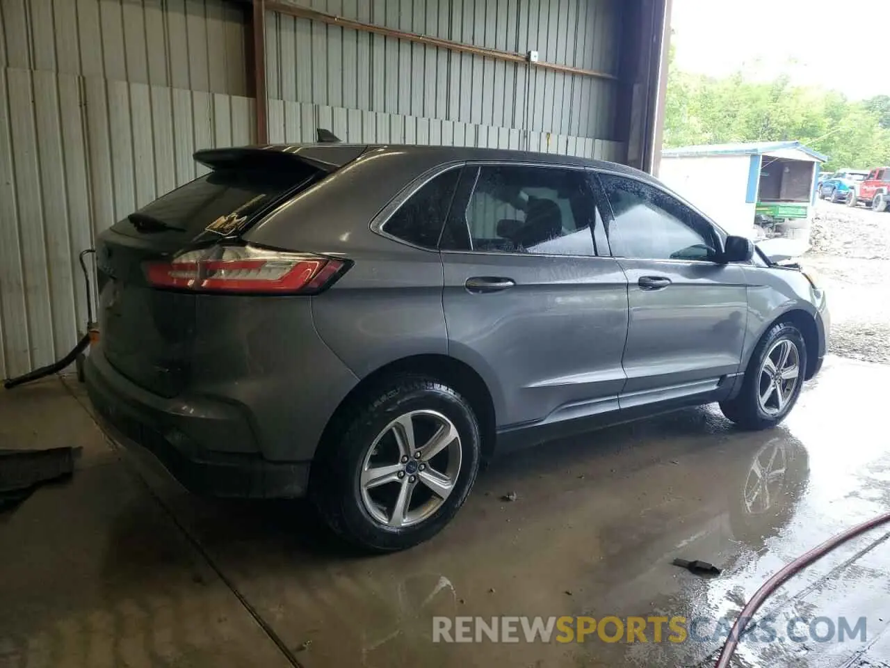 3 fotografías del automóvil dañado 2FMPK4J90NBA97327 FORD EDGE 2022