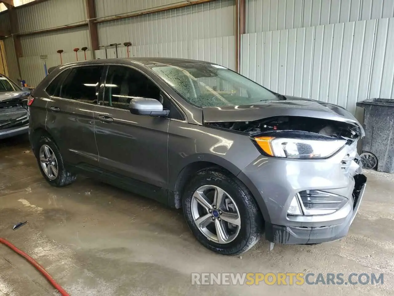 4 fotografías del automóvil dañado 2FMPK4J90NBA97327 FORD EDGE 2022