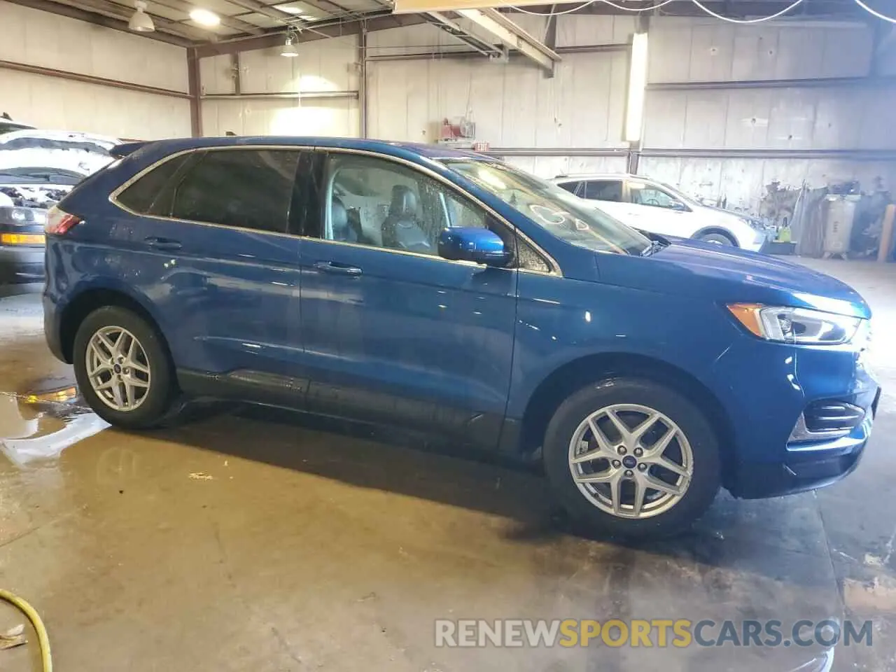 4 fotografías del automóvil dañado 2FMPK4J91NBA44796 FORD EDGE 2022