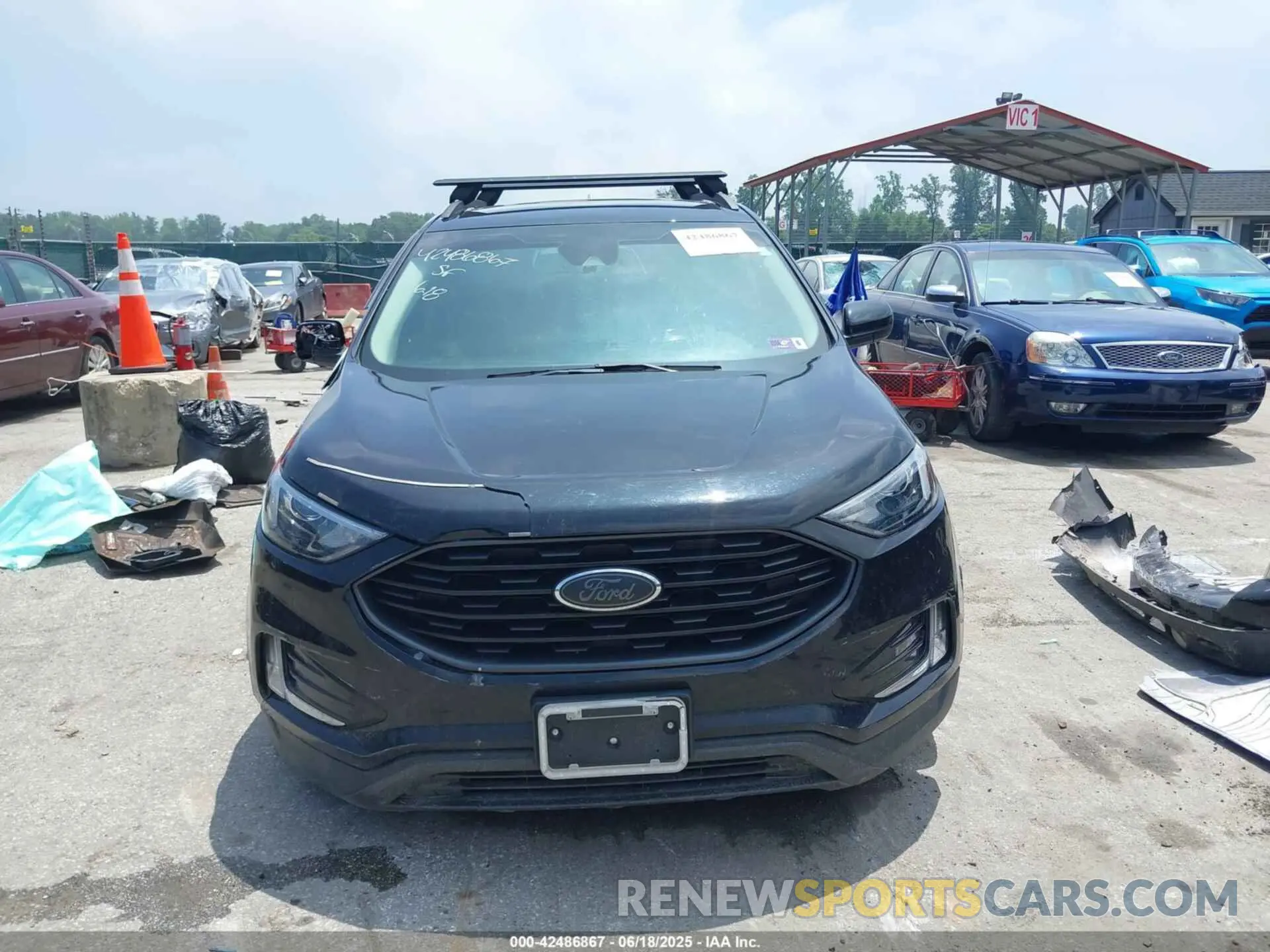 12 fotografías del automóvil dañado 2FMPK4J93NBB10930 FORD EDGE 2022