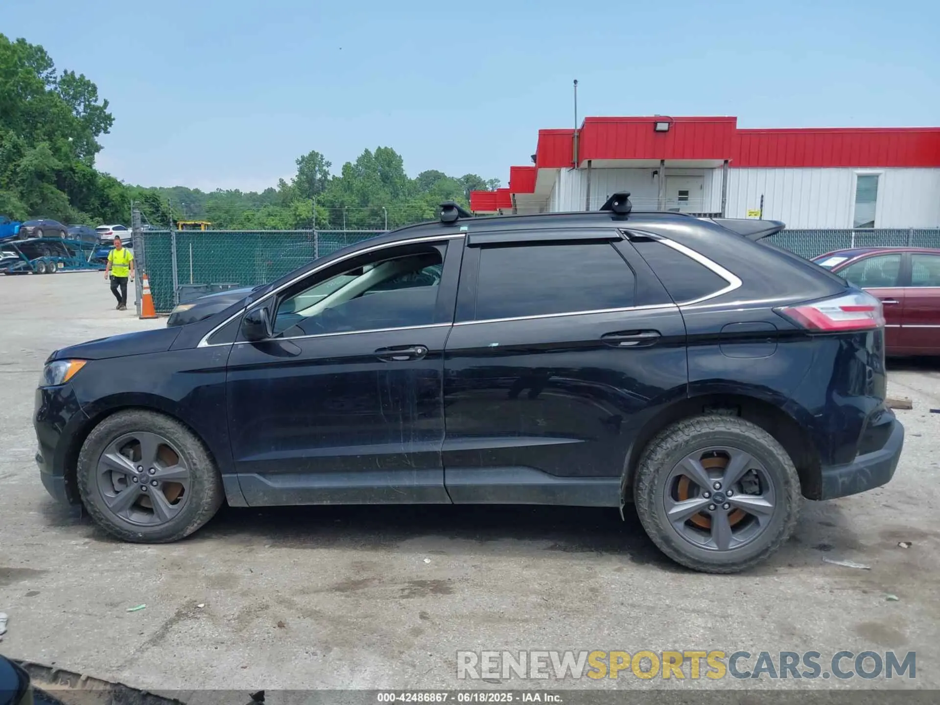 14 fotografías del automóvil dañado 2FMPK4J93NBB10930 FORD EDGE 2022