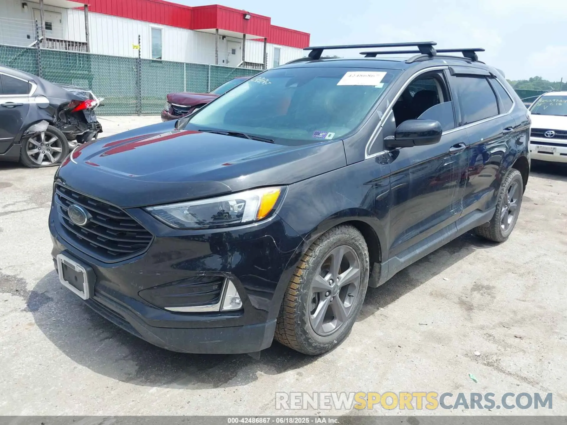 2 fotografías del automóvil dañado 2FMPK4J93NBB10930 FORD EDGE 2022