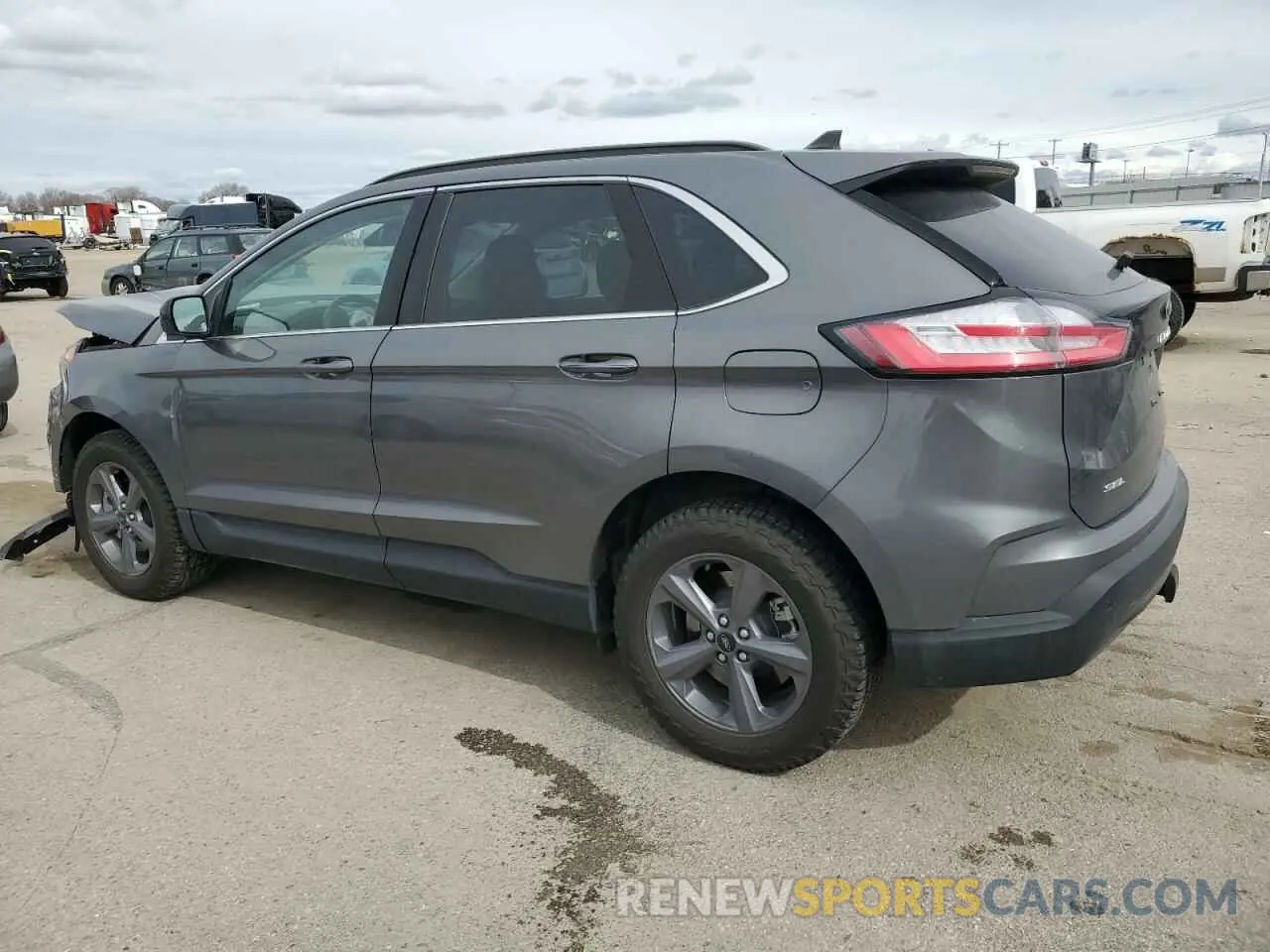 2 fotografías del automóvil dañado 2FMPK4J93NBB11379 FORD EDGE 2022