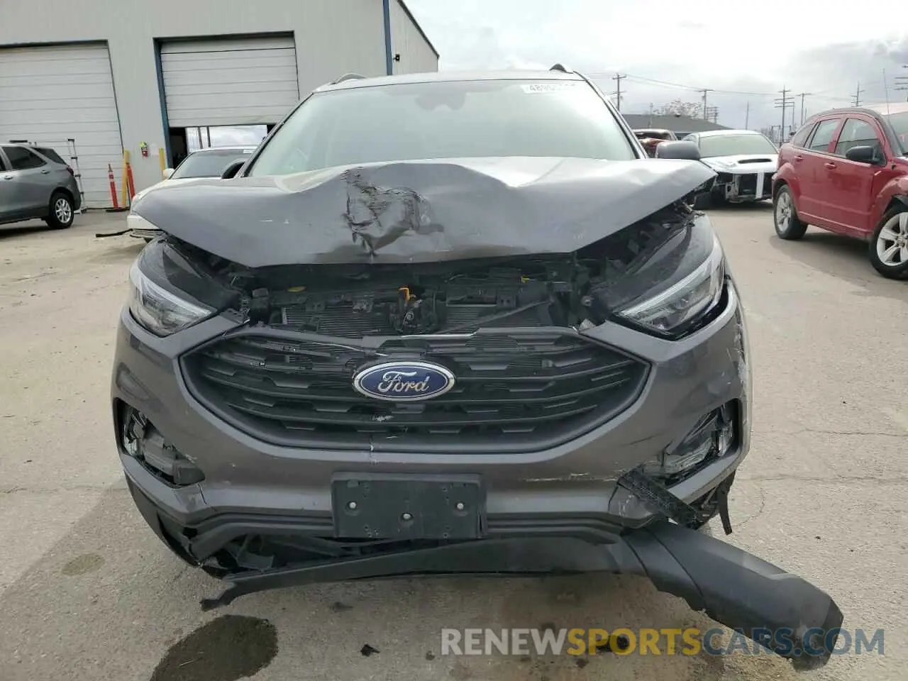 5 fotografías del automóvil dañado 2FMPK4J93NBB11379 FORD EDGE 2022