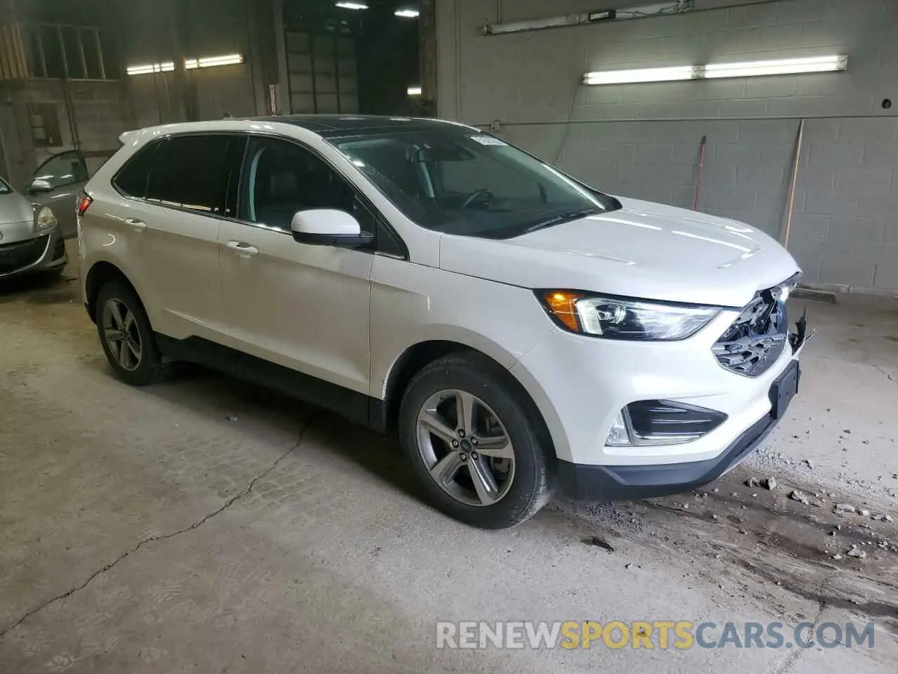 4 fotografías del automóvil dañado 2FMPK4J94NBA71040 FORD EDGE 2022