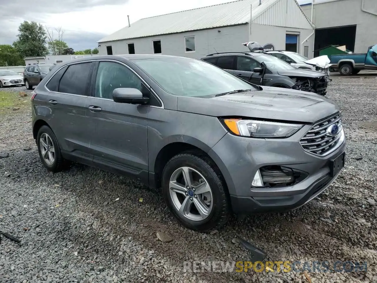 4 fotografías del automóvil dañado 2FMPK4J94NBA99999 FORD EDGE 2022