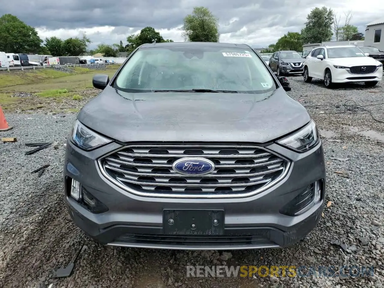 5 fotografías del automóvil dañado 2FMPK4J94NBA99999 FORD EDGE 2022
