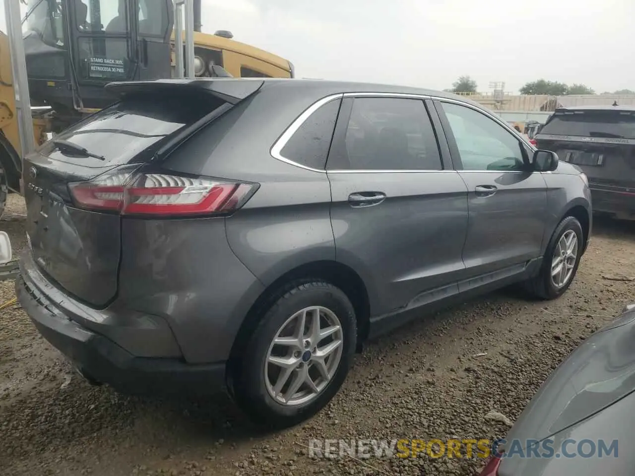 3 fotografías del automóvil dañado 2FMPK4J94NBB05610 FORD EDGE 2022