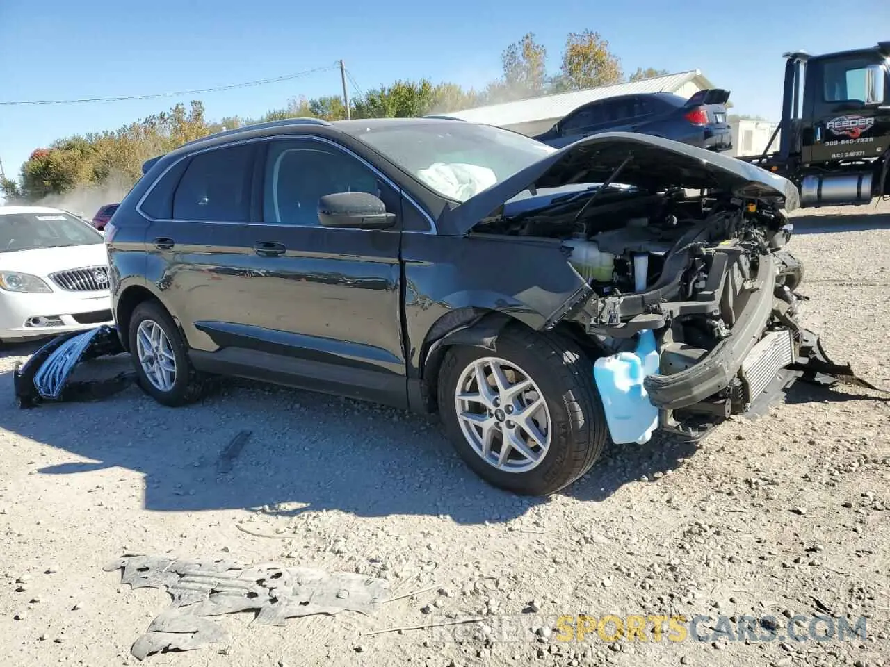 4 fotografías del automóvil dañado 2FMPK4J94NBB09429 FORD EDGE 2022