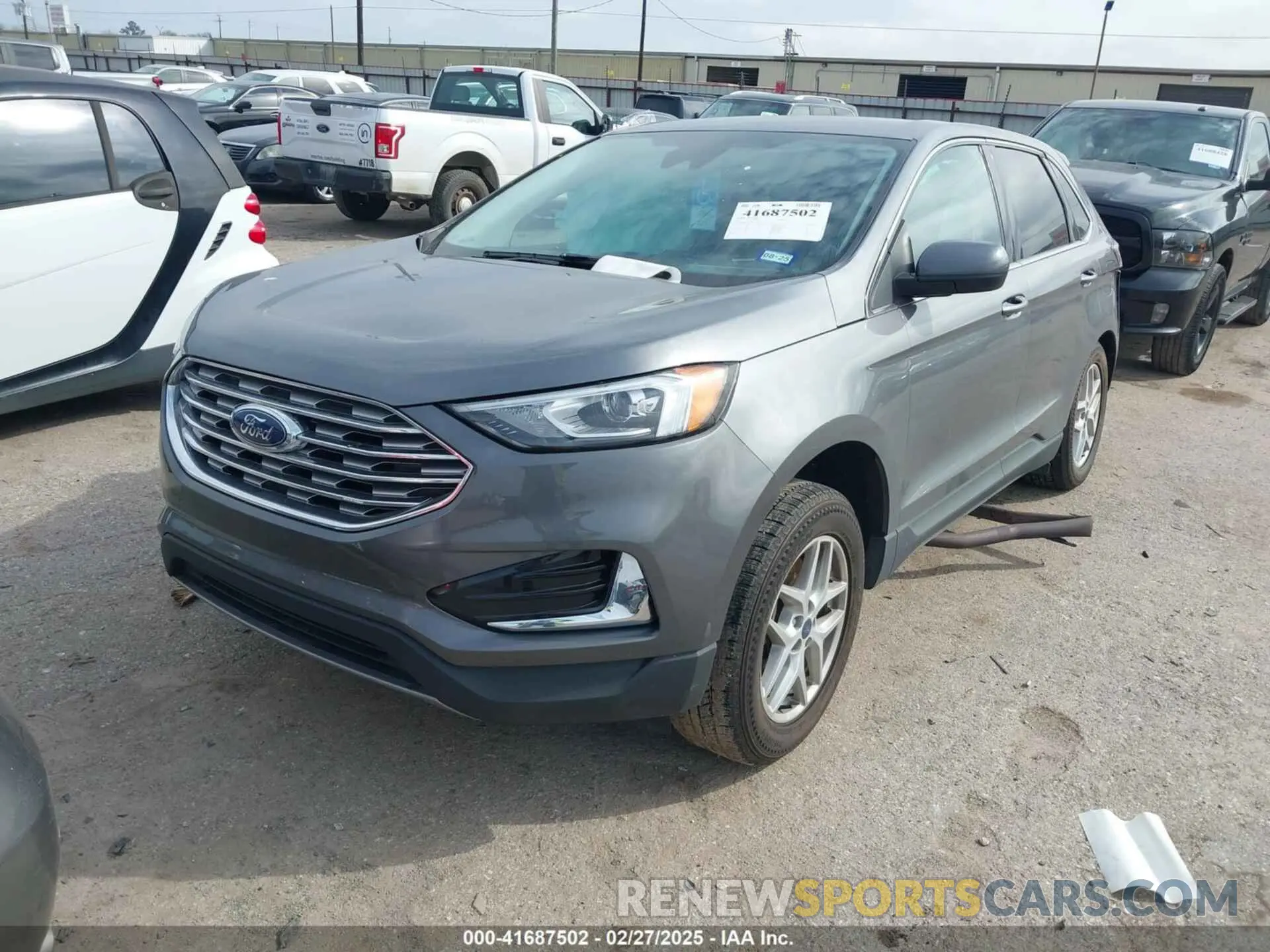 2 fotografías del automóvil dañado 2FMPK4J96NBA41604 FORD EDGE 2022