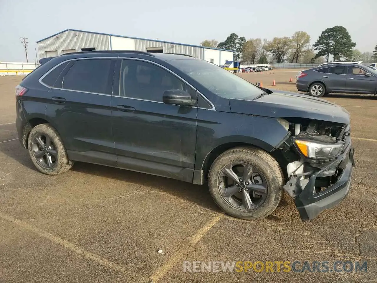 4 fotografías del automóvil dañado 2FMPK4J97NBB00143 FORD EDGE 2022