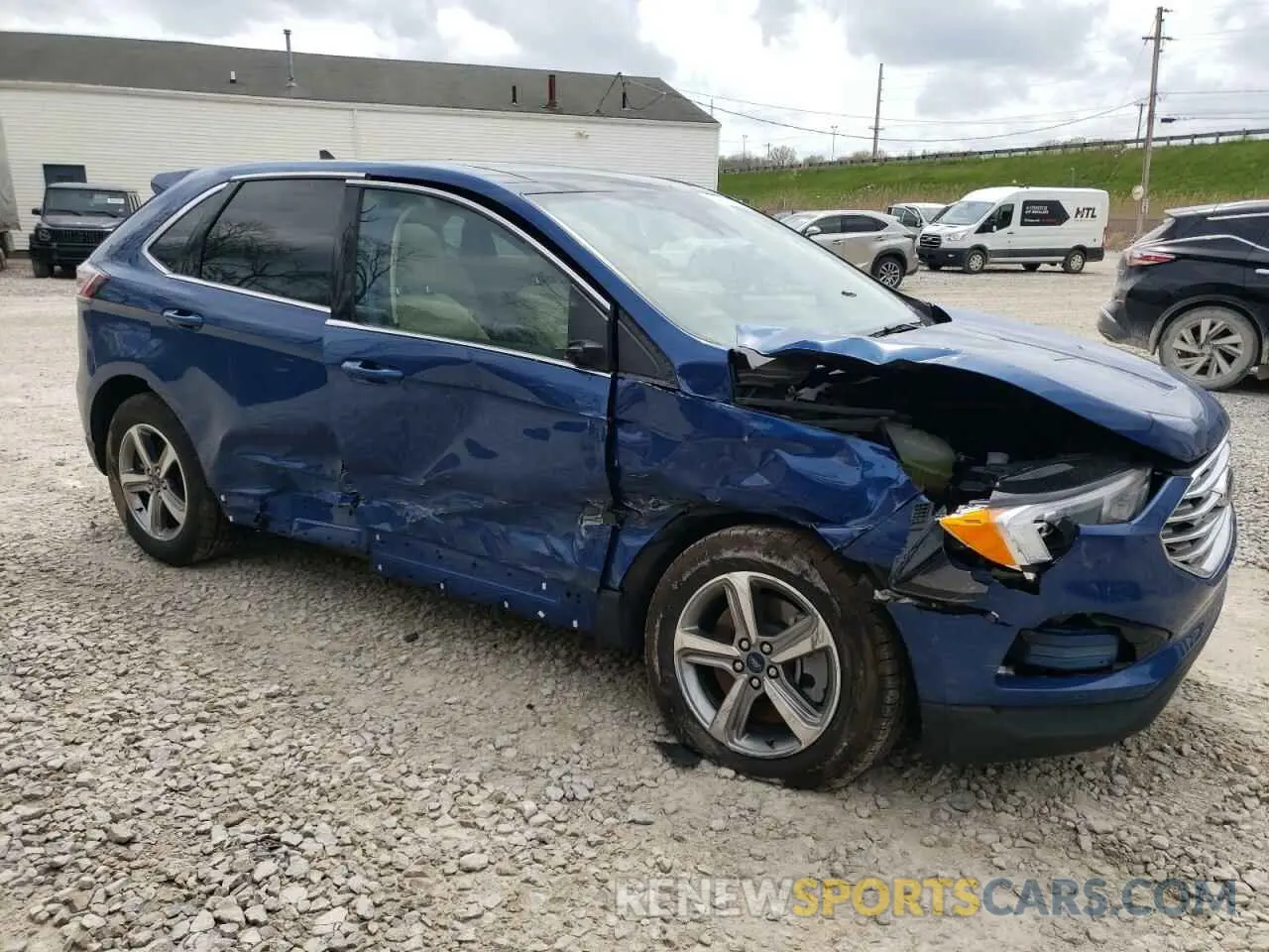 4 fotografías del automóvil dañado 2FMPK4J98NBB13788 FORD EDGE 2022
