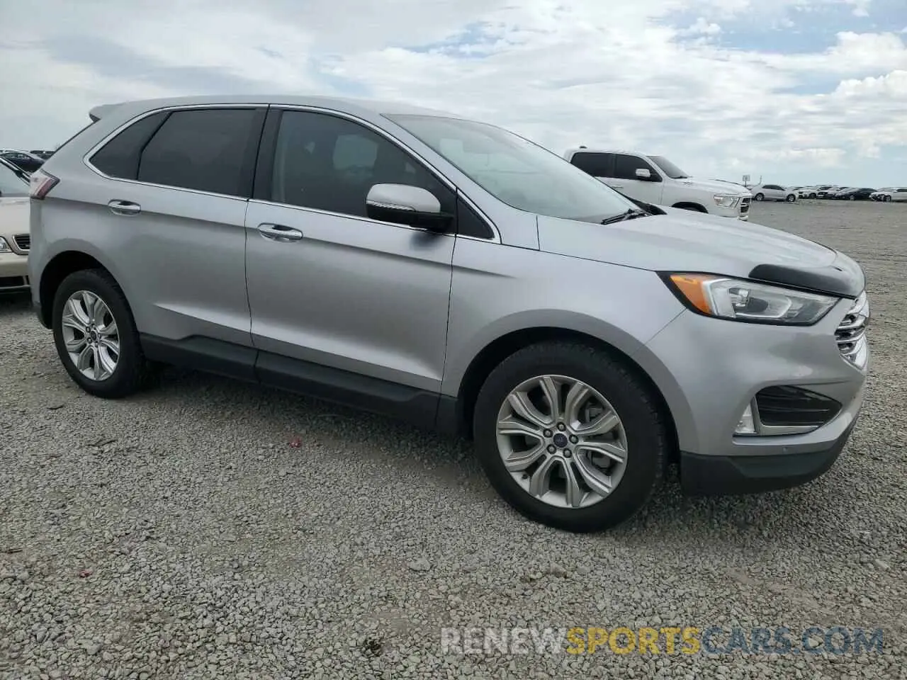 4 fotografías del automóvil dañado 2FMPK4K95NBA15140 FORD EDGE 2022