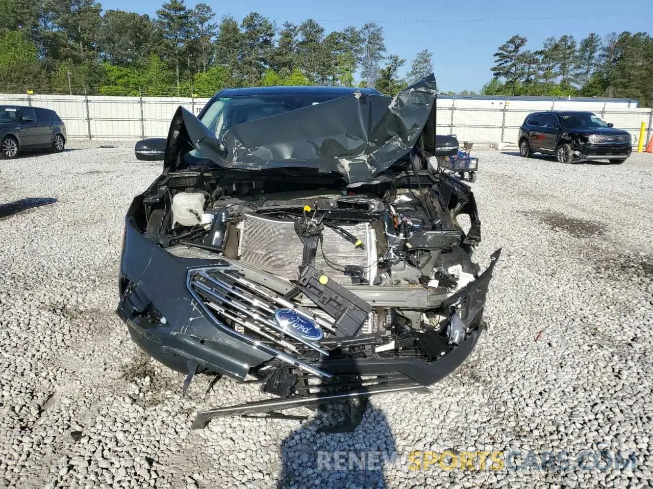5 fotografías del automóvil dañado 2FMPK4K95NBB14640 FORD EDGE 2022