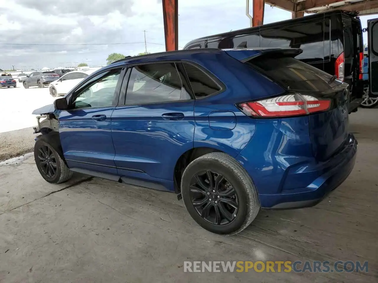 2 fotografías del automóvil dañado 2FMPK4G95PBA41961 FORD EDGE 2023