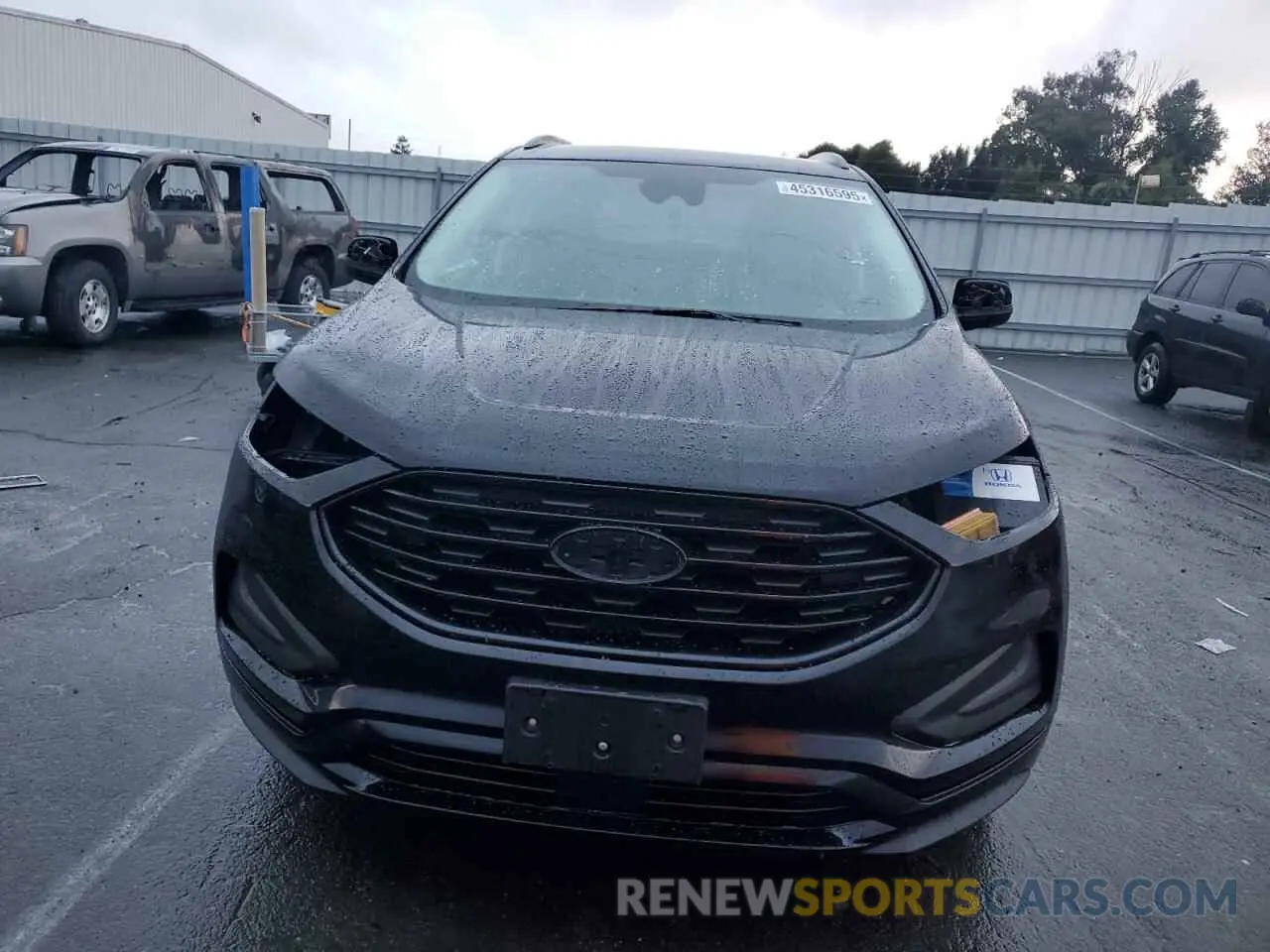 5 fotografías del automóvil dañado 2FMPK4G98PBA11708 FORD EDGE 2023