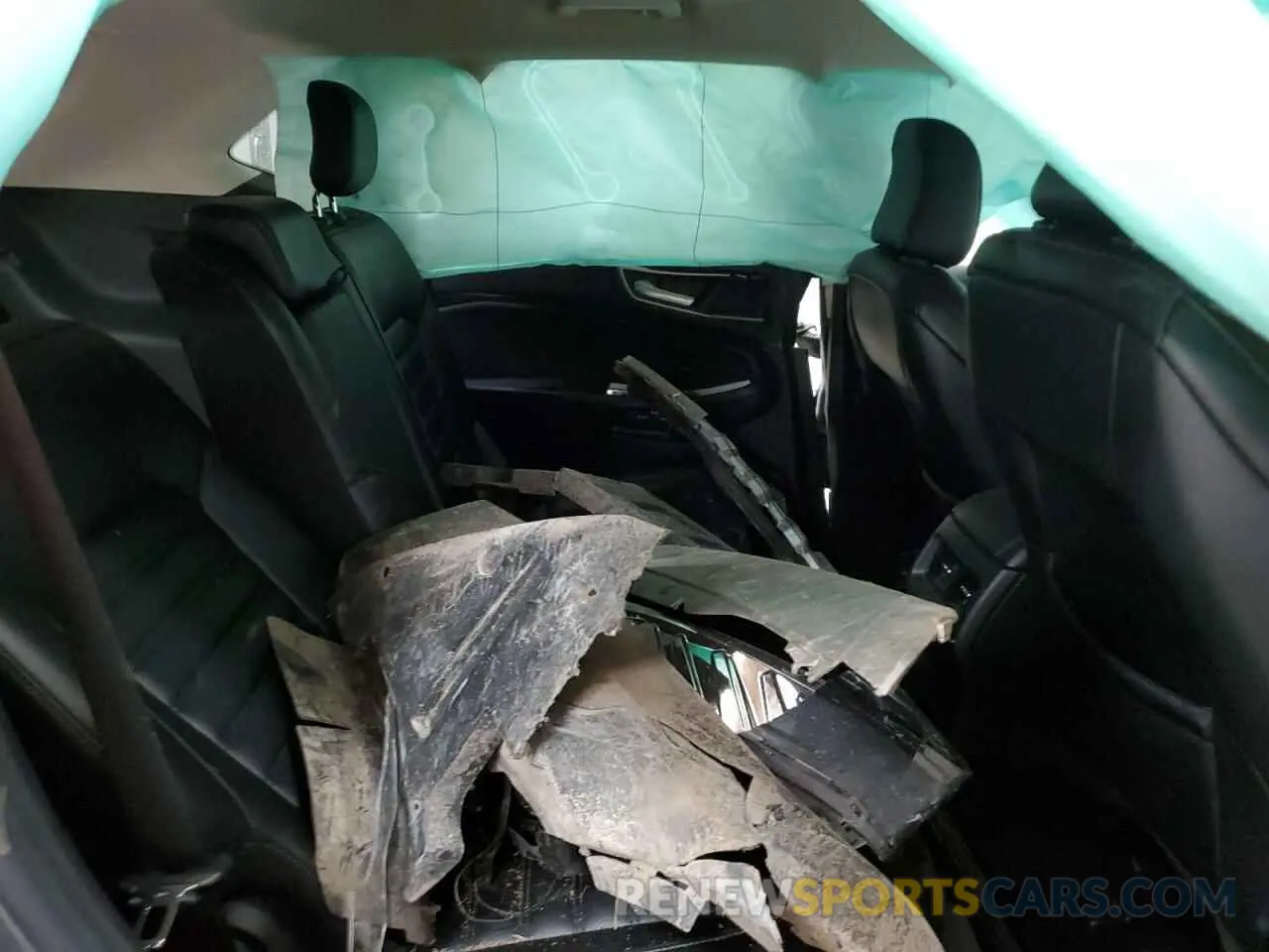 11 fotografías del automóvil dañado 2FMPK4J92PBA31462 FORD EDGE 2023