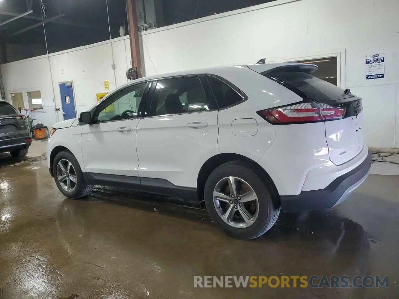 2 fotografías del automóvil dañado 2FMPK4J94PBA22570 FORD EDGE 2023