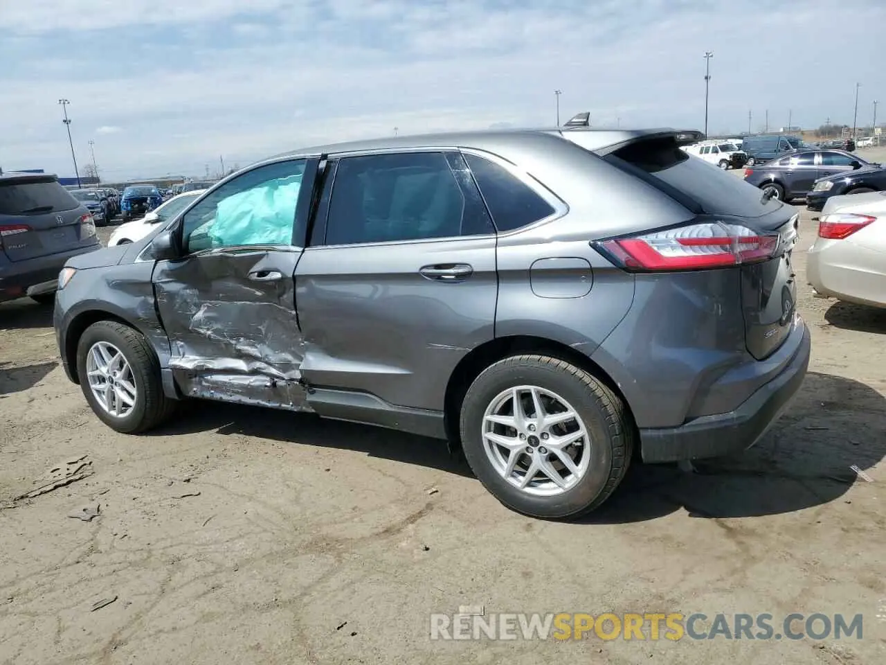 2 fotografías del automóvil dañado 2FMPK4J95PBA00531 FORD EDGE 2023