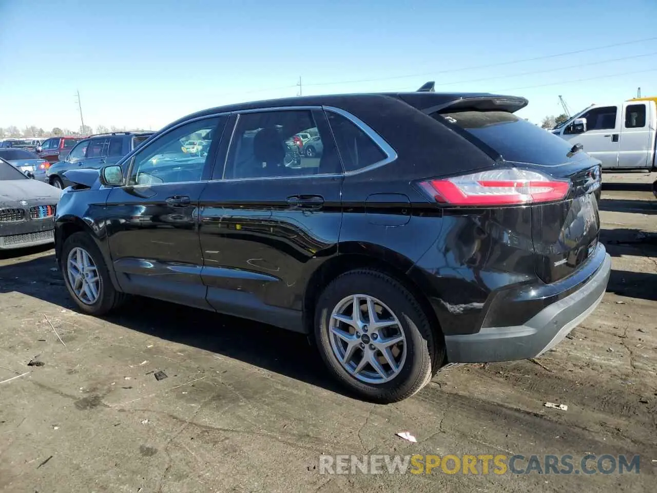 2 fotografías del automóvil dañado 2FMPK4J95PBA20990 FORD EDGE 2023