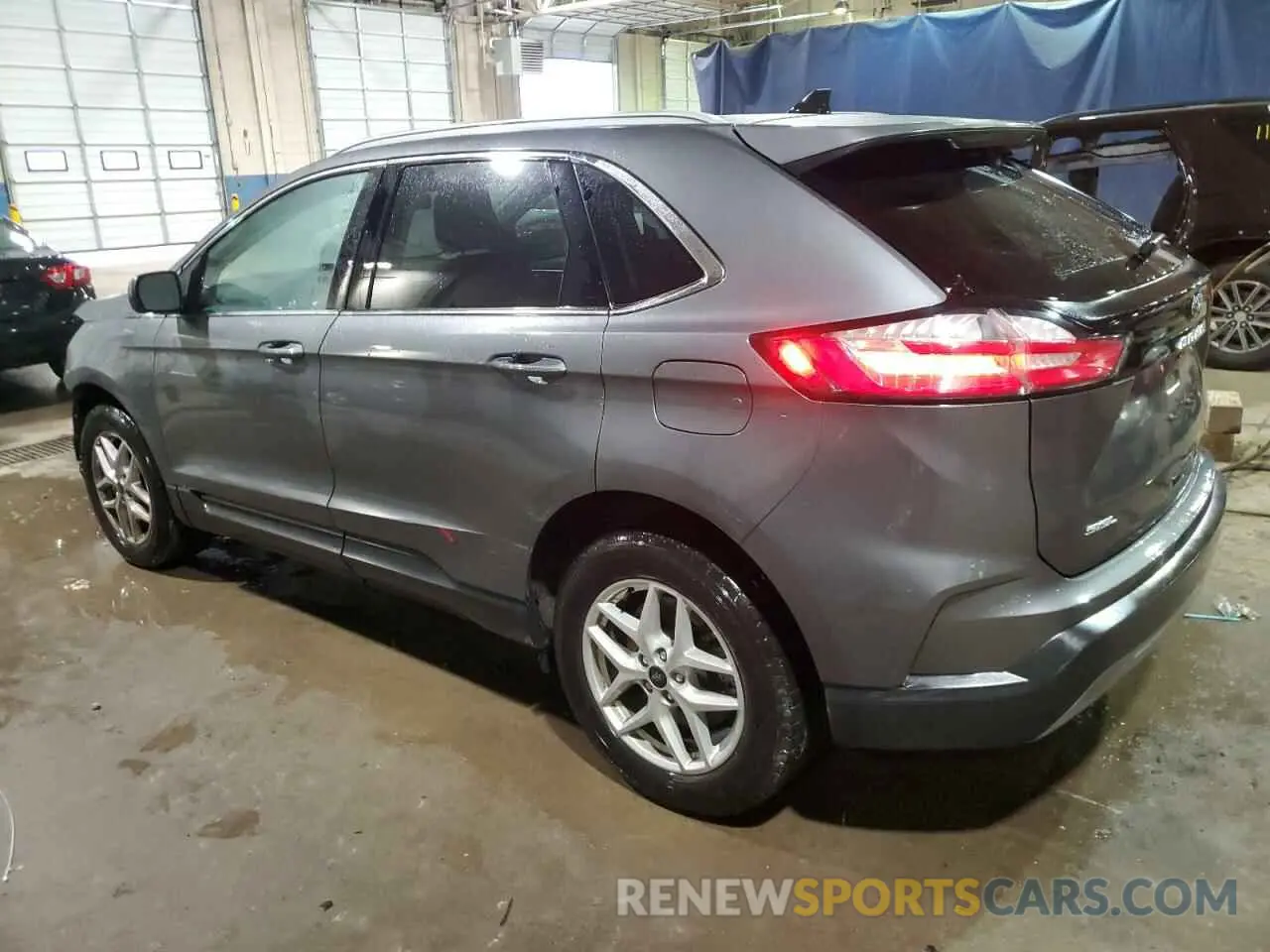 2 fotografías del automóvil dañado 2FMPK4J96PBA17967 FORD EDGE 2023