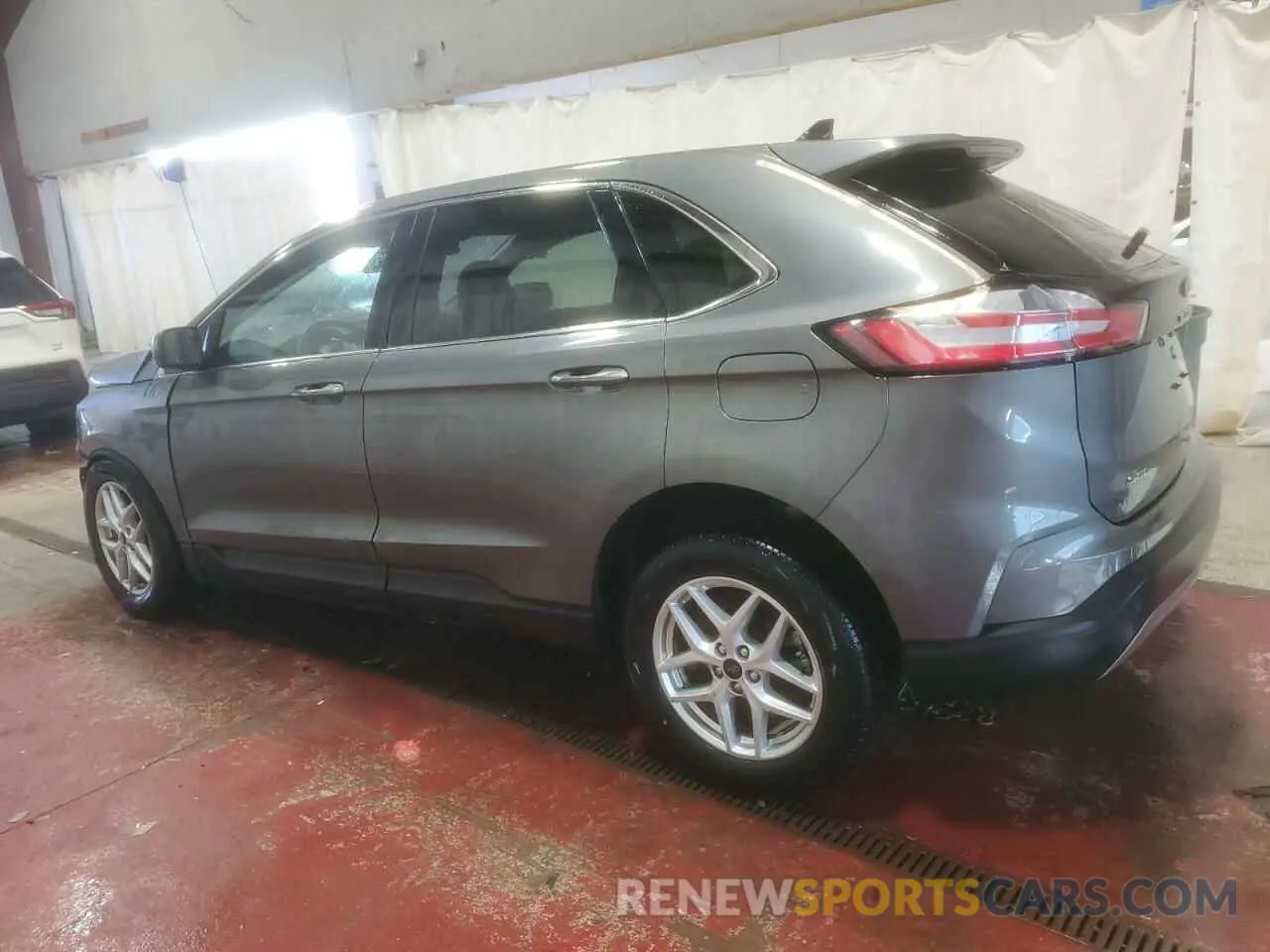 2 fotografías del automóvil dañado 2FMPK4J96PBA21713 FORD EDGE 2023